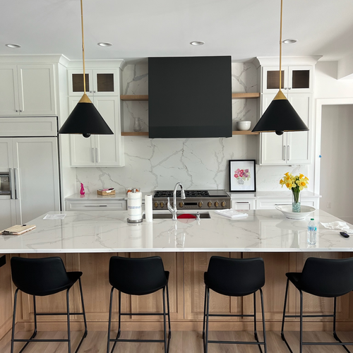 Modern kitchen renovation with tile backsplash and granite countertops in Franklin, Indiana