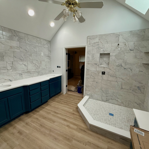 Stylish bathroom remodel showcasing tile, flooring, and modern finishes in Central Indiana