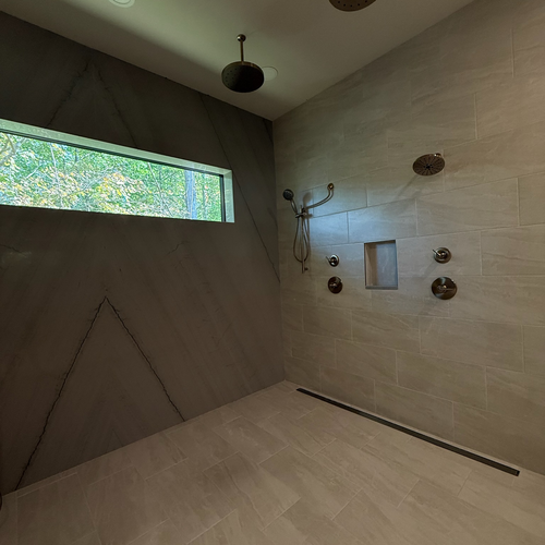 Bathroom remodel with new tile flooring and shower in Greenwood, IN