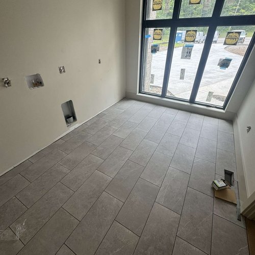 “Floor Tech Corp installed modern tile floors in Greenwood, IN home