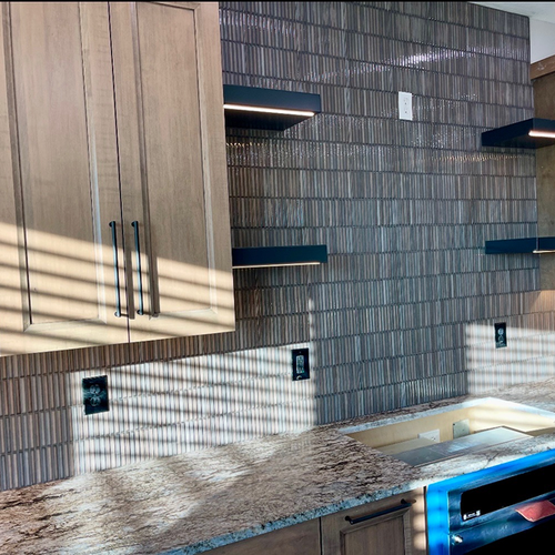 Custom tile backsplash and shower surround in Greenwood home